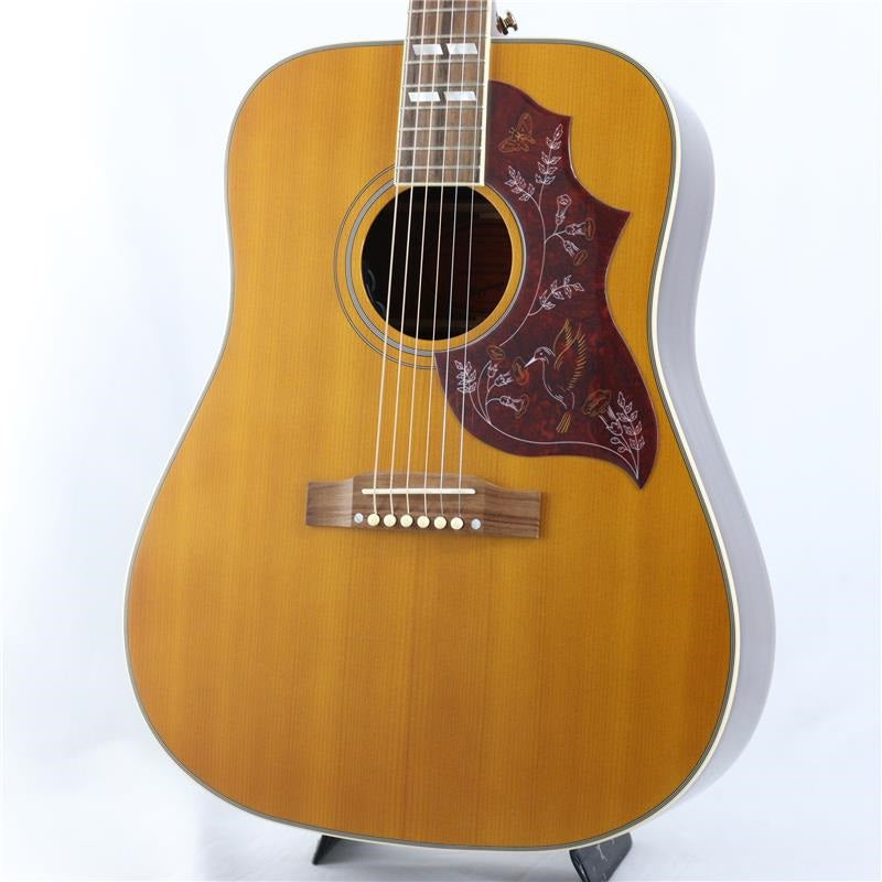 Used_Masterbilt_Inspired_by_Gibson_Hummingbird_(Aged_Antique_Natural_Gloss)_Epiphone_01